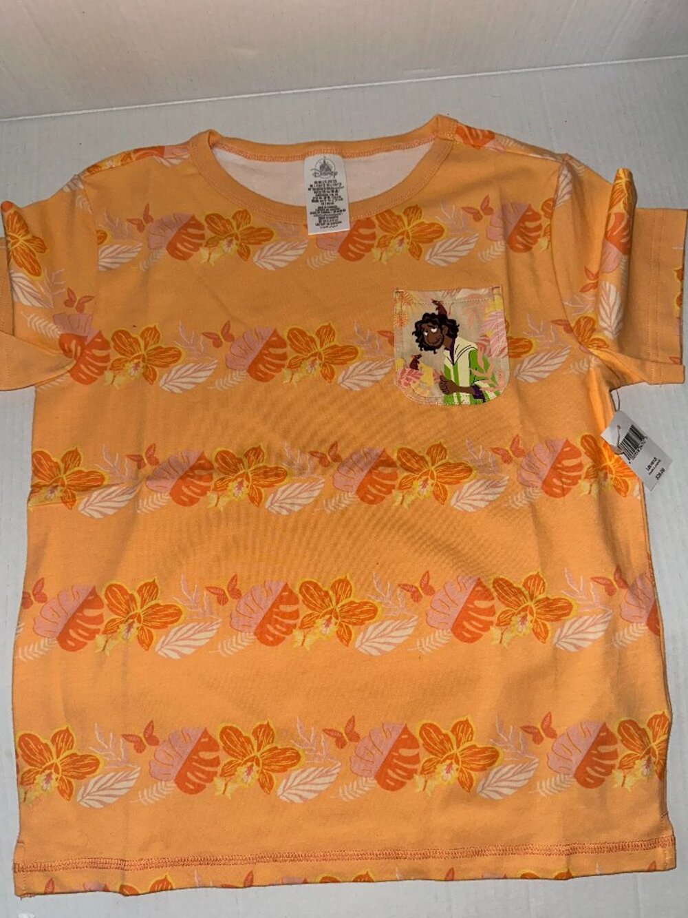 Disney Encanto Bruno Youth L 10/12 Tropical Floral Pocket T-Shirt NWT Orange